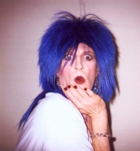 Graham as Sally "The Tart" with blue hair.