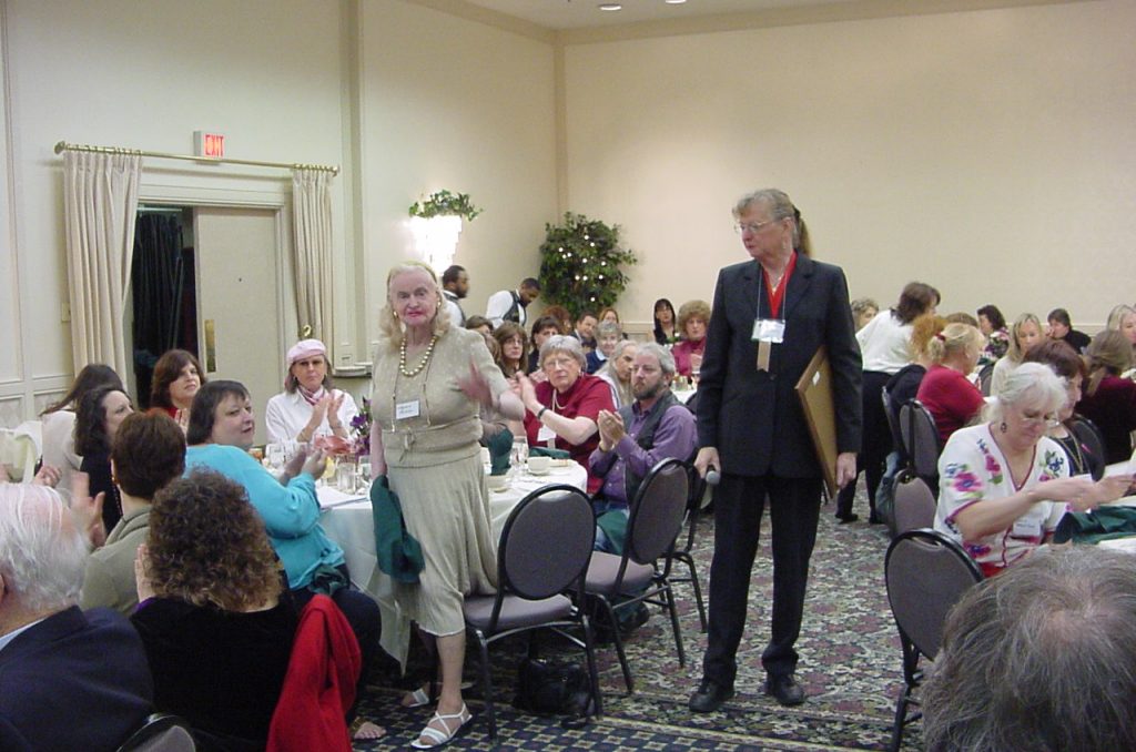Yvonne Cook-Riley, at right, at the 2004 Virginia Prince Award Ceremony. Virginia is standing to Yvonne’s left. That’s me in the aqua sweater.