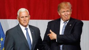Pence (L) with Trump.